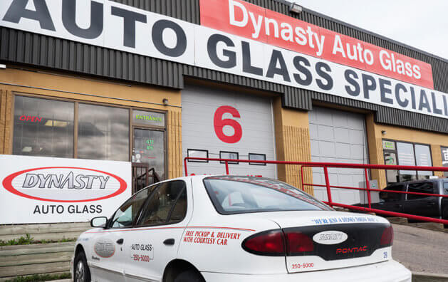 main door of the company with Dnasty Auto Glass sign