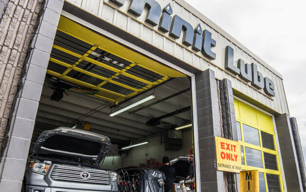 Garage entrance, Minit Lube logo