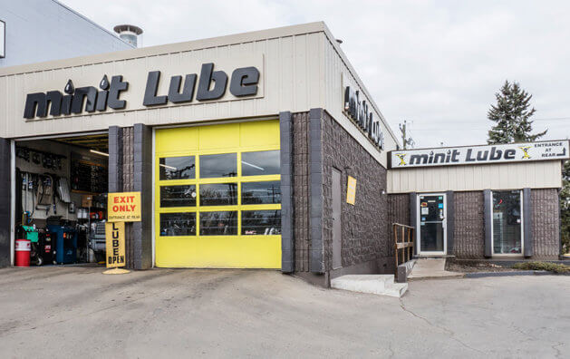 Garage entrance, Minit Lube logo