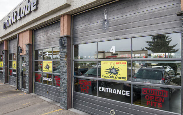 Front door of the company with Minit Lube sign