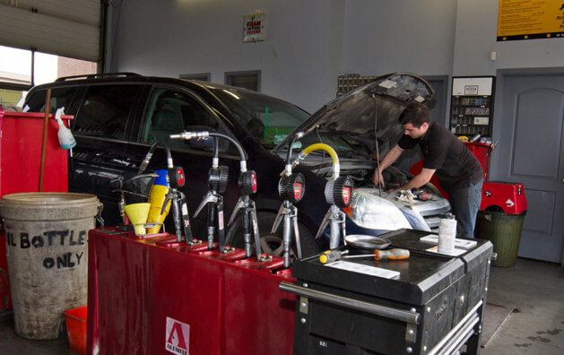 mechanic repairing truck in the garage