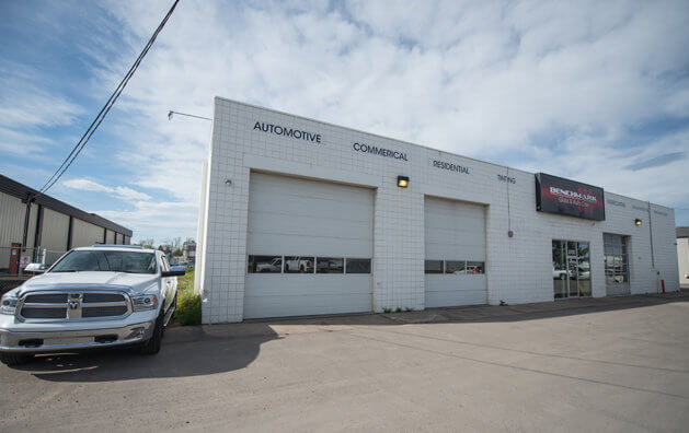 front of the company, white walls garage entrance