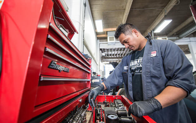 mechanic choosing tools to work