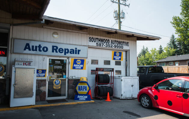 Facade of Southwood Automotive, with a red car parked.